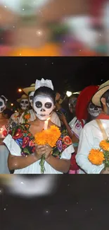 People in Day of the Dead festive attire with painted faces and flowers.