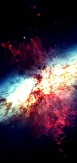 Vibrant galaxy explosion with cosmic colors on a mobile phone wallpaper.