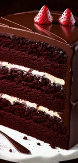 Chocolate layer cake with strawberries on a white plate.