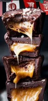 Decadent stack of chocolate caramel bars with gooey texture and luxurious appeal.