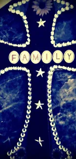 Decorative cross with family text on a dark blue background.