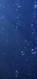 Deep blue wallpaper with rising bubbles