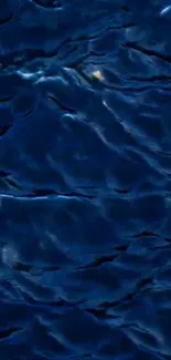 Deep blue ocean waves create a tranquil phone wallpaper.