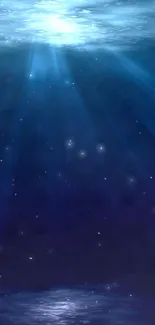 Deep sea blue mobile wallpaper with light rays.