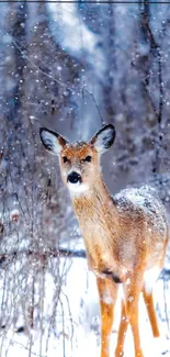 Deer standing in a snowy forest during winter with falling snowflakes.