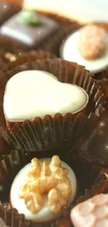 Assorted chocolates in a decorative box for a sweet mobile wallpaper.