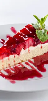 Slice of berry cheesecake with mint garnishing.