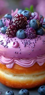 Vibrant donut with berries and pink frosting.