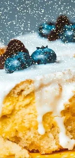 Blueberry cakes with creamy icing on a plate.