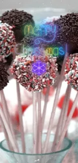 Cake pops with chocolate and sprinkles in a glass bowl.