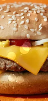 Close-up of a cheeseburger with sesame bun and toppings on orange background.