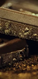 Close-up of rich chocolate bars on a textured surface.