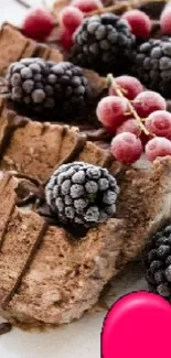 Chocolate cake with berries and a pink heart.