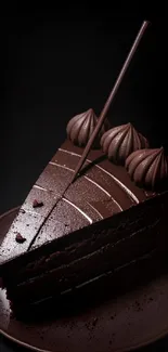 Slice of rich chocolate cake with smooth frosting