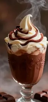 Creamy chocolate dessert in a glass decorated with swirls.