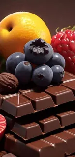 Chocolate bars topped with fresh fruits including blueberries and raspberries.
