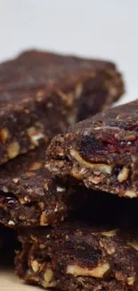 Close-up of chocolate energy bars with nuts.