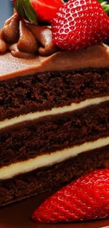 Chocolate cake slice with strawberries on top.