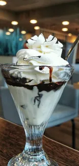A delectable chocolate sundae with whipped cream in a clear glass.
