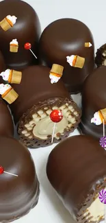 Chocolate-covered marshmallow treats on white background.