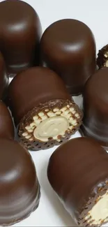 Stacks of delicious chocolate-covered sweets.