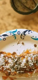 Close-up of a dessert plate with toppings and vibrant colors.