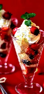 Delicious dessert with berries and cream on a red background.
