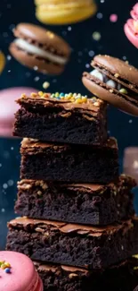 Stack of brownies surrounded by colorful macarons.