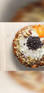 Cake with almonds and fruits on wooden table wallpaper.