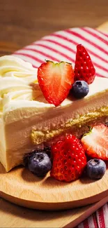 Creamy dessert slice topped with berries on a wooden platter.