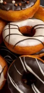 Stack of deliciously decorated donuts with chocolate and icing.