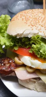 Gourmet burger with lettuce and sesame bun close-up.