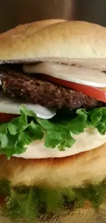 Gourmet burger with lettuce, tomato, and mozzarella on golden surface.