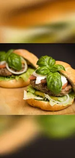 Gourmet burger with fresh basil on wooden board wallpaper.