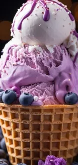 Ice cream cone with purple scoops and blueberries.