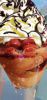Ice cream sundaes topped with cherries and chocolate in glass cups.