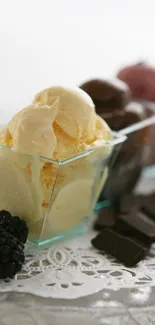 Vanilla ice cream with berries and chocolate on a decorative tray.