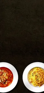 Two plates of Italian food on a dark background mobile wallpaper.