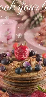 Pancake stack with berries and 'Cook your life' text on a pink background.