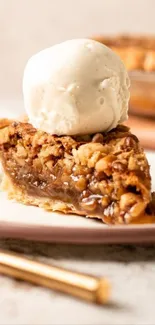 A delicious slice of pie topped with vanilla ice cream on a plate.