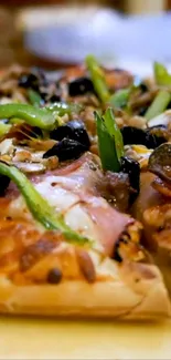 Close-up view of a delicious pizza with toppings and melted cheese.