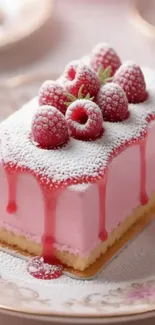 Raspberry cake with pink icing and sugar on a decorative plate.