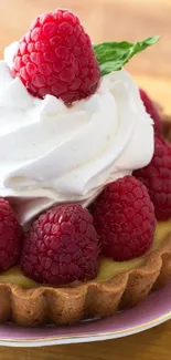 A delicious raspberry tart with cream topping.