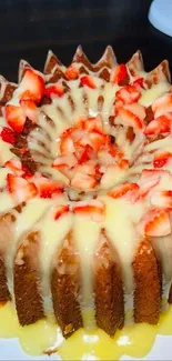 Strawberry cake with creamy glaze and fresh toppings.