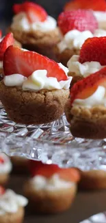 Strawberry cream dessert bites on glass platter.