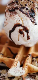 Delicious waffle topped with ice cream and chocolate syrup on a plate.