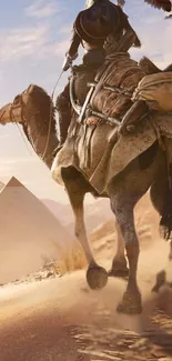 Camel rider in a vast desert near a pyramid under a clear sky.