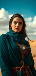 Woman in teal attire in desert landscape with blue sky.