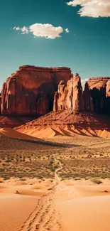 Desert landscape with golden sands and cliffs under a teal sky.