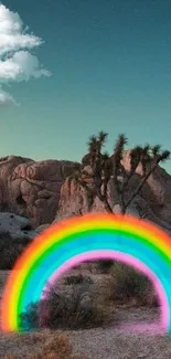 Neon rainbow in desert landscape at dusk.